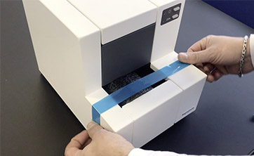 tape the protection foam in place on the cassette printer
